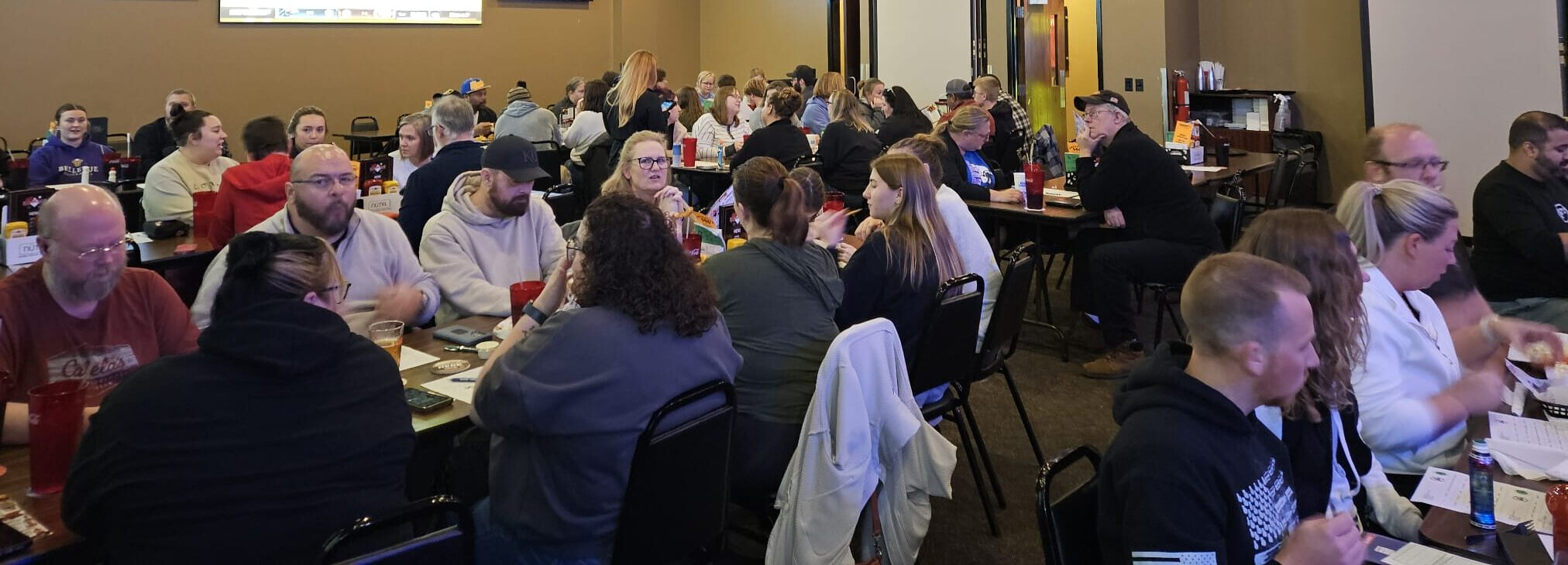 Group of people playing music bingo and singing